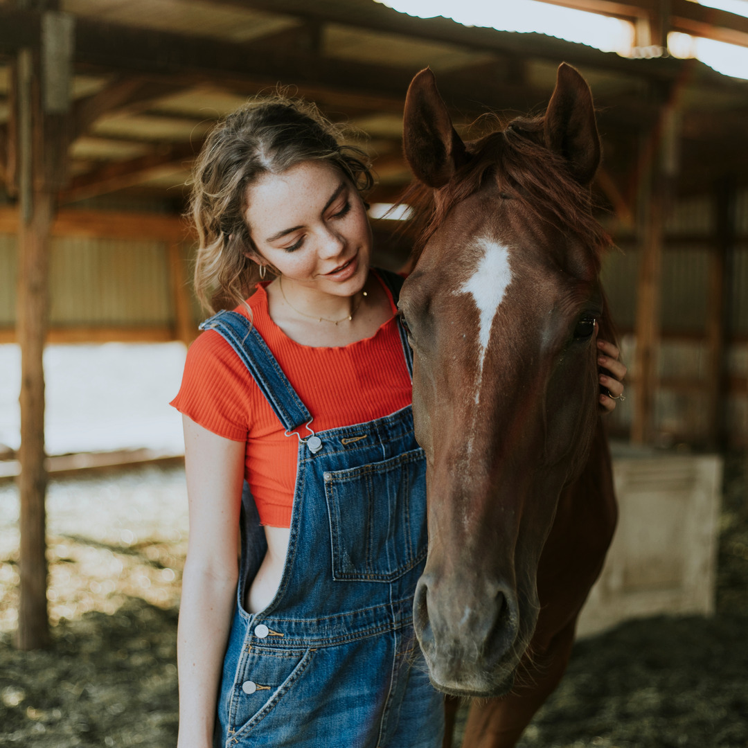 Portrait of a girl and a horse